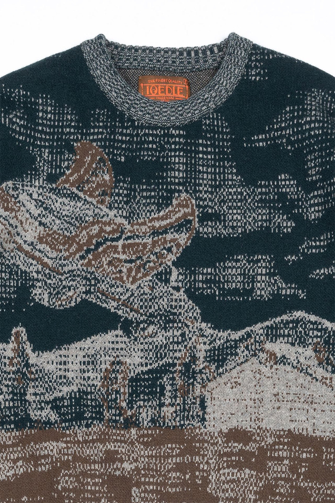 Navy sweatshirt by IOEDLE featuring a lighthouse at night design, soft knit fabric, and comfortable fit.