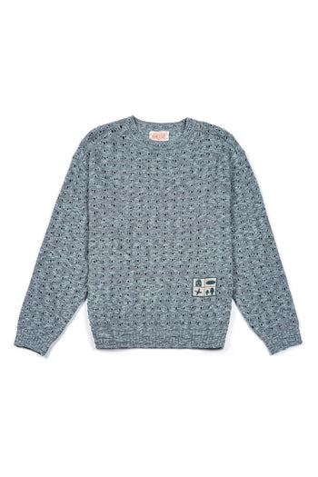 IOEDLE Beyond The Glass Mesh Knit Blue sweatshirt, lightweight blue knit fabric with mesh detailing, casual and stylish.