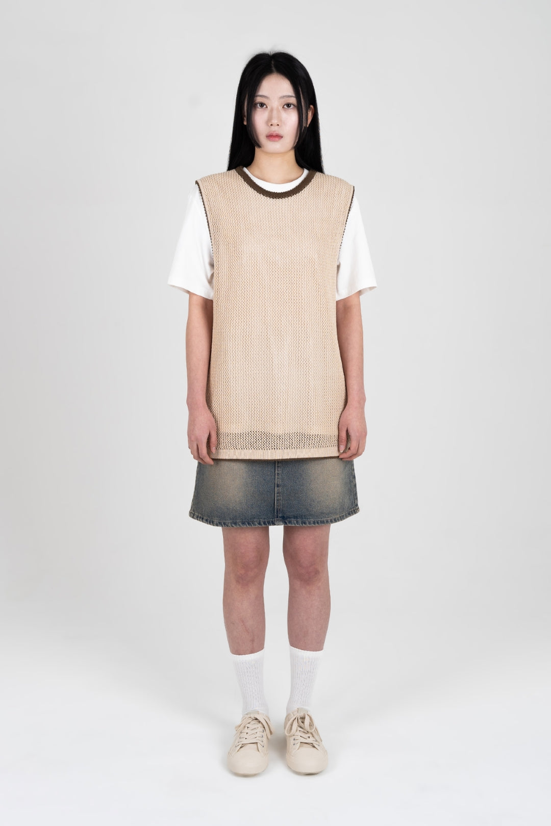 Beige Berry Entwined Mesh Vest by IOEDLE, a stylish sleeveless top with intricate mesh design and berry accents.