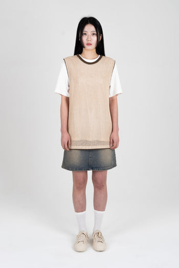 Beige Berry Entwined Mesh Vest by IOEDLE, a stylish sleeveless top with intricate mesh design and berry accents.