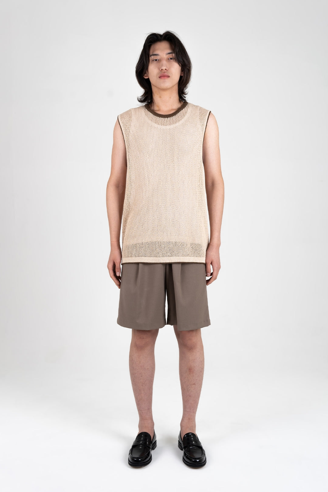 Beige IOEDLE Berry Entwined Mesh Vest, a stylish sleeveless top with a textured mesh design, perfect for layered looks.