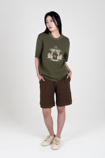 Khaki knitted top from IOEDLE's Practical Utopia collection, featuring a comfortable, stylish design and textured fabric.
