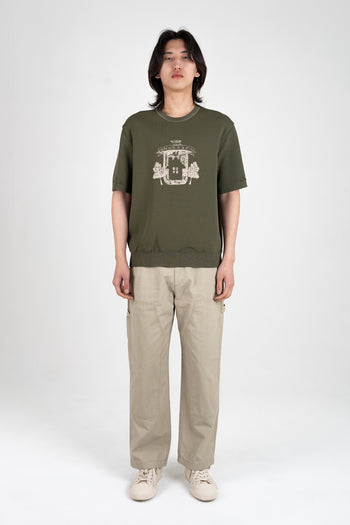 IOEDLE Practical Utopia knitted top in khaki, casual long-sleeve blouse with ribbed texture and relaxed fit.