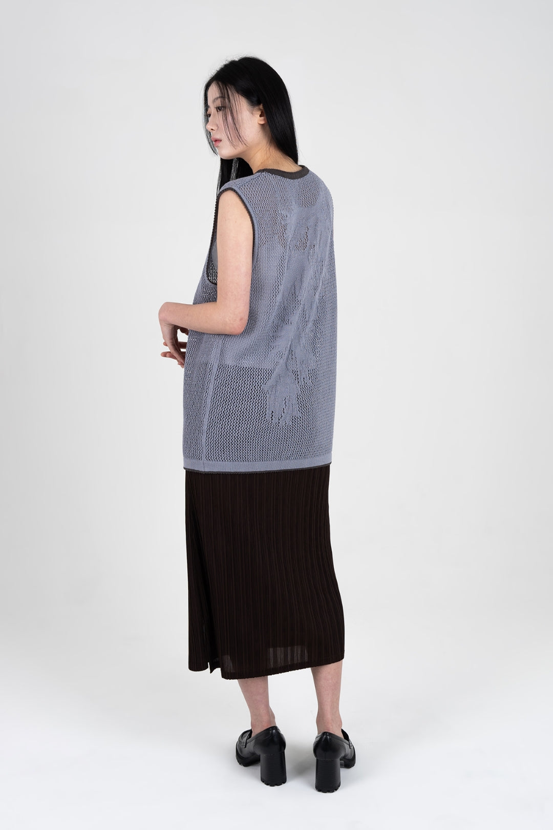 Sky blue IOEDLE Berry Entwined Mesh Vest, a stylish tops piece with intricate mesh design and vibrant color.