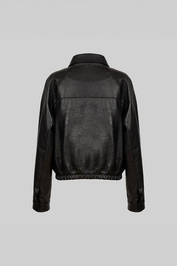 Black lamb skin raglan jacket by Lunecave, showcasing smooth leather texture and relaxed fit in a stylish jacket design.