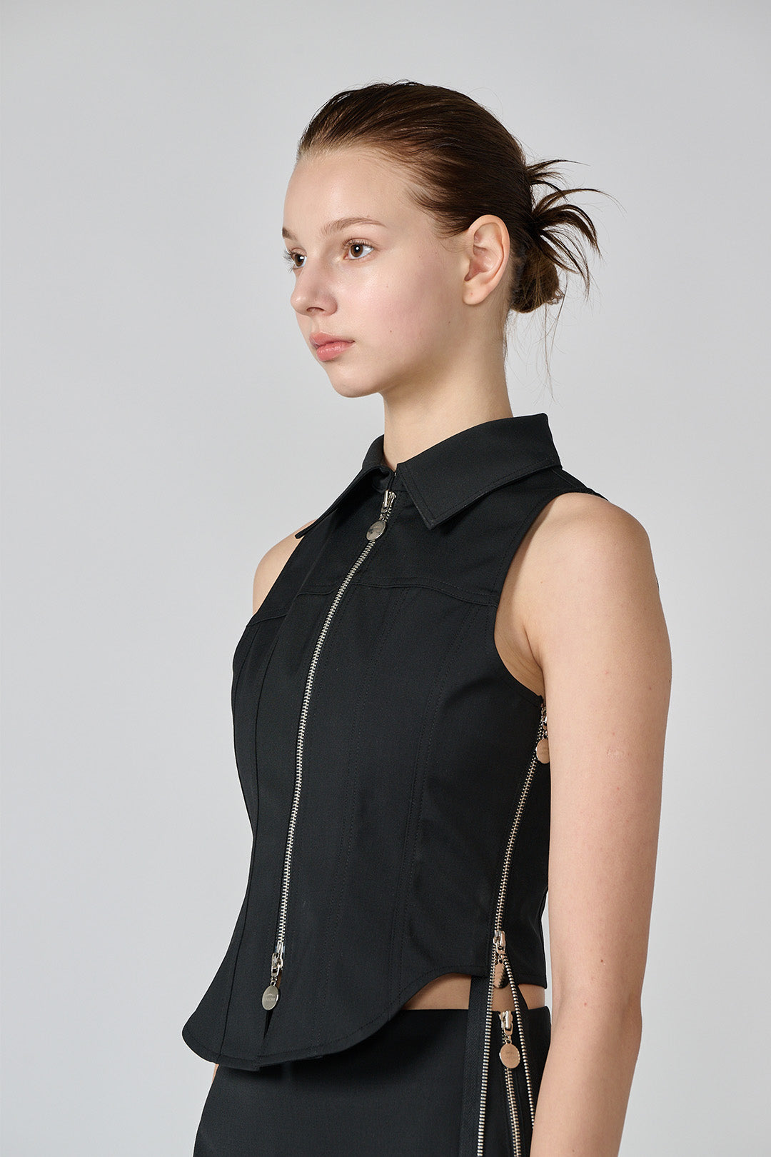 Black wool vest by Lunecave, a stylish tops piece with a fitted design and textured fabric for a cozy, versatile look.