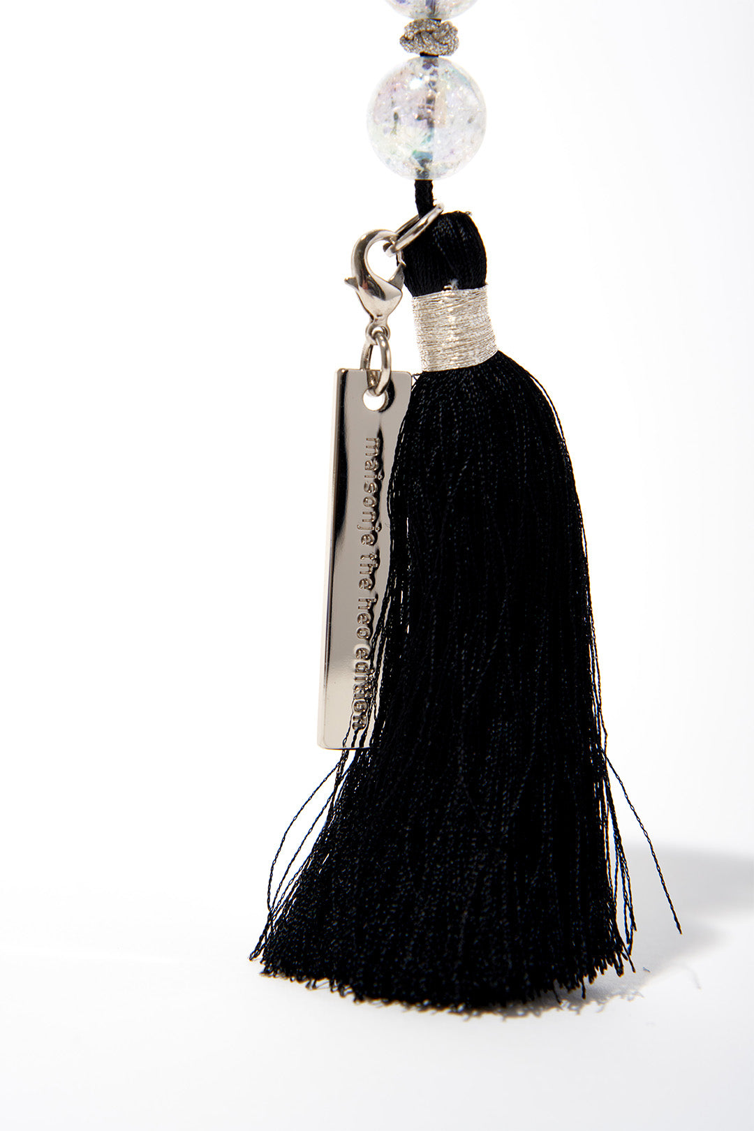 Blue metal Noriggae key ring charm from MAISONJE with intricate design, perfect for accessorizing keys or bags.