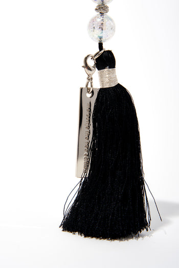 Blue metal Noriggae key ring charm from MAISONJE with intricate design, perfect for accessorizing keys or bags.