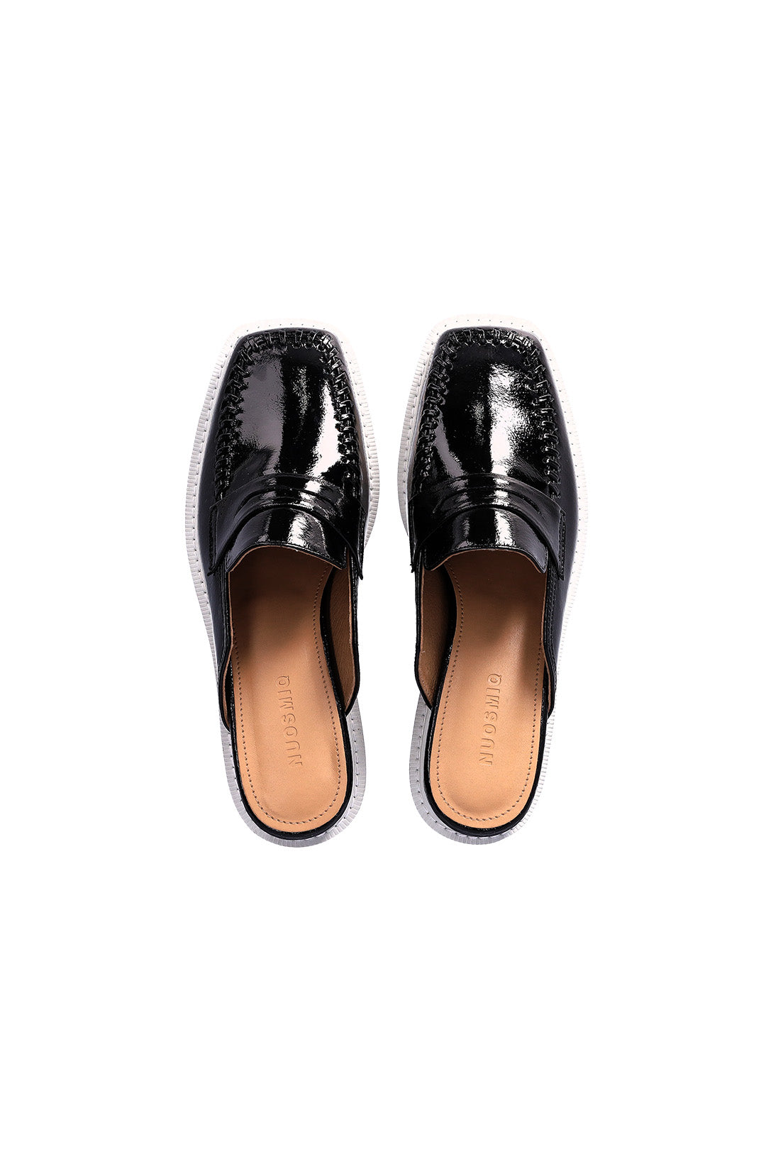 Nuosmiq Puka Platform Black Bloafers showing black loafers with platform soles and sleek design.
