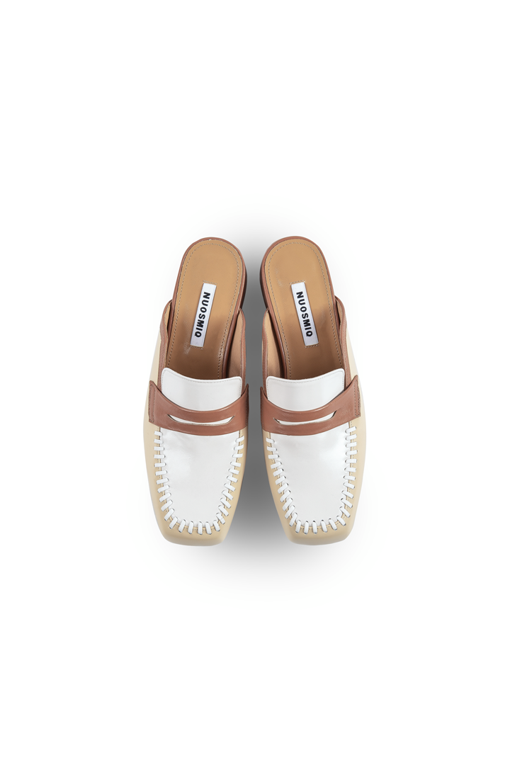 Nuosmiq Puka Bloafers Butter, stylish slip-on loafers in a soft butter color, featuring a smooth leather finish.