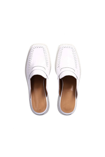 Nuosmiq Puka Platform White Bloafers showing white slip-on shoes with a chunky platform sole and smooth finish.