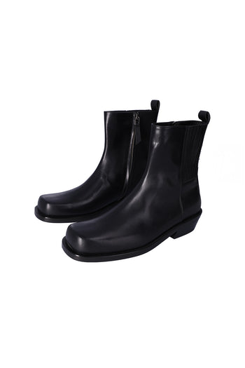 Black Rama Chelsea boots by Nuosmiq featuring sleek leather design and elastic side panels.