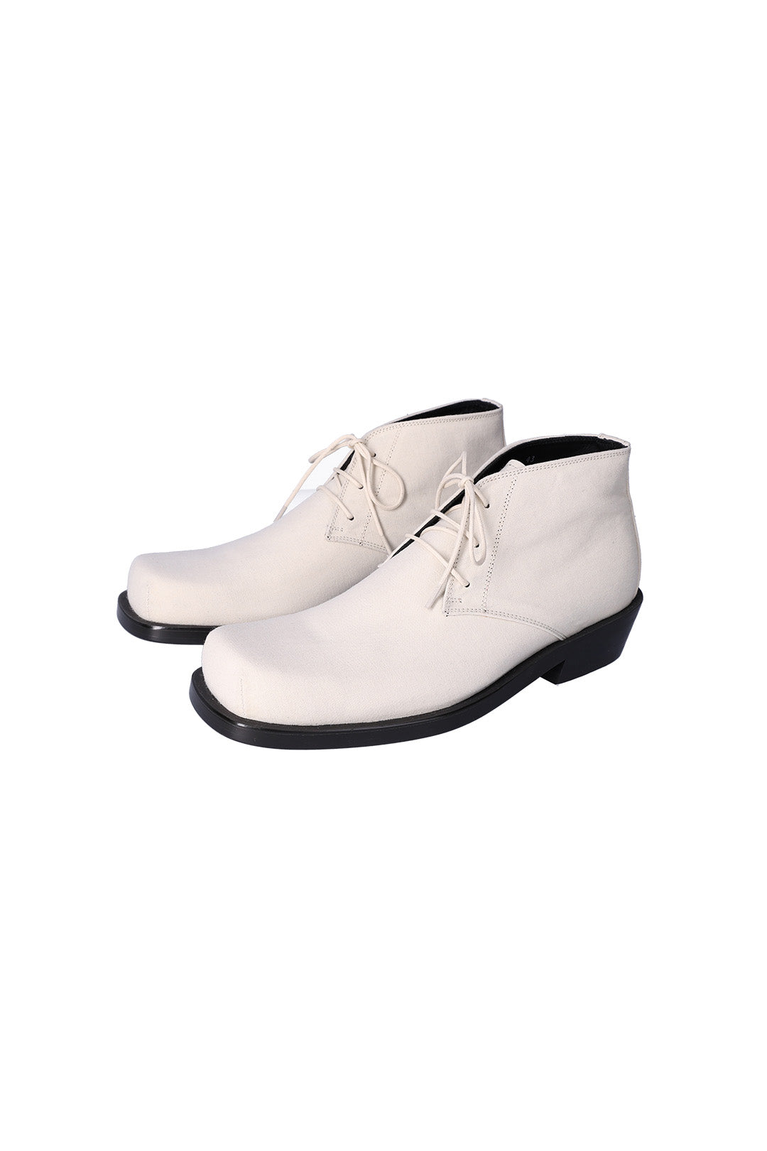 Nuosmiq Basa Chukka Ivory boots featuring smooth ivory leather and classic ankle-height design.