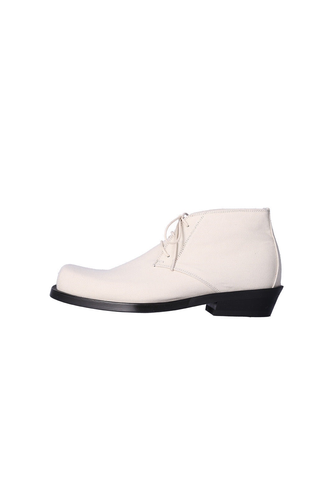 Nuosmiq Basa Chukka Ivory boots featuring smooth ivory leather and classic ankle-height design.