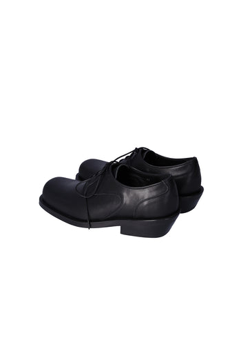 Black Nuosmiq Hardy Derby shoe showing smooth leather upper and classic lace-up design.