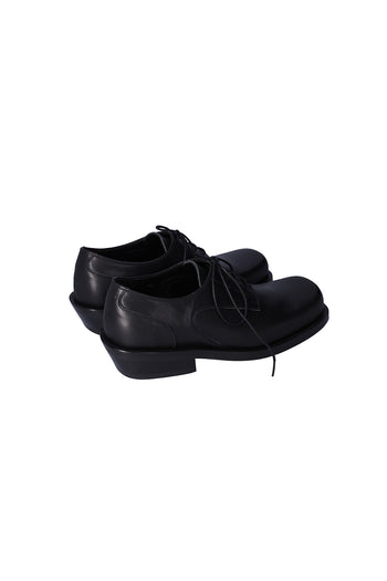Nuosmiq Hardy Derby Black shoe showing classic black leather derby style with sleek design and polished finish.