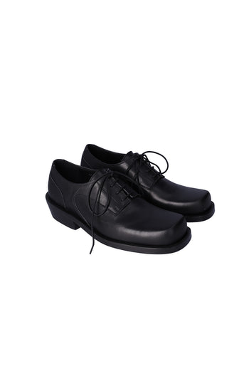 Black Hardy Derby shoes by Nuosmiq featuring classic lace-up design and polished leather finish.