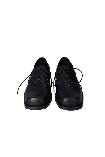 Nuosmiq Hardy Derby Black shoe showing sleek black leather upper and classic derby design.
