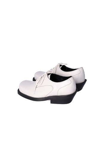 Nuosmiq Hardy Derby Ivory shoe showcasing its elegant design and smooth leather material, ideal for stylish formal wear.