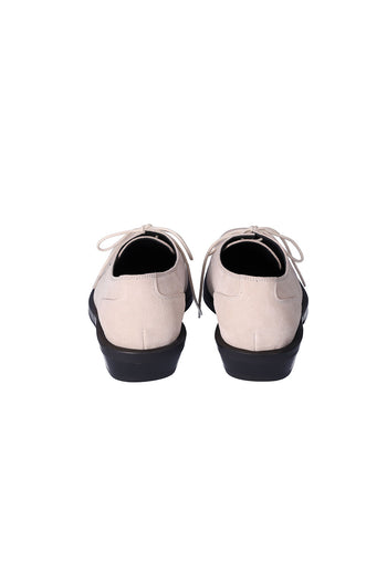 Nuosmiq Hardy Derby shoes in light beige leather, showing their classic design and smooth finish.