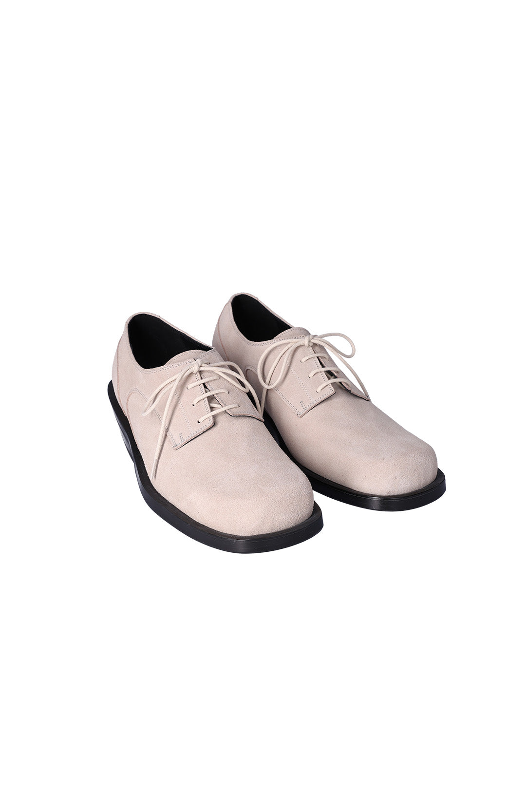 Nuosmiq Hardy Derby shoes in light beige leather, showing close-up of stylish design and smooth finish.