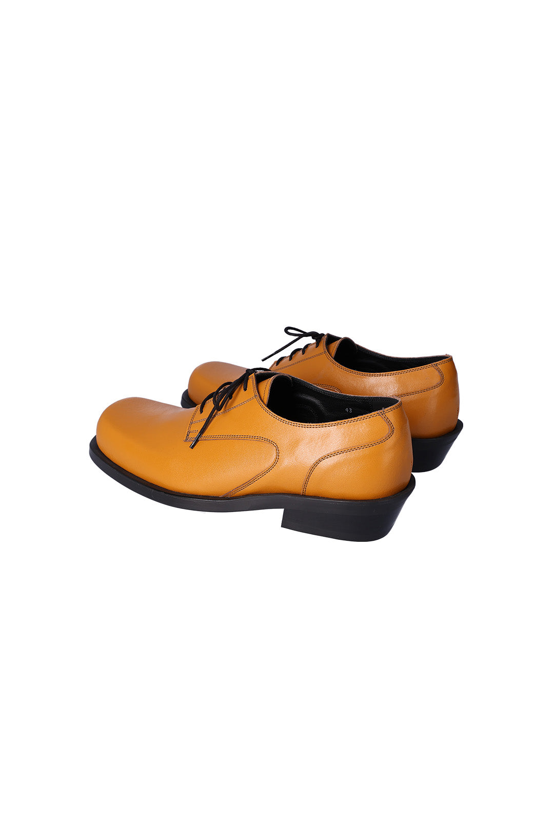 Nuosmiq Hardy Derby Mustard derby in natural beige fabric with black piping and a leather strap detail.