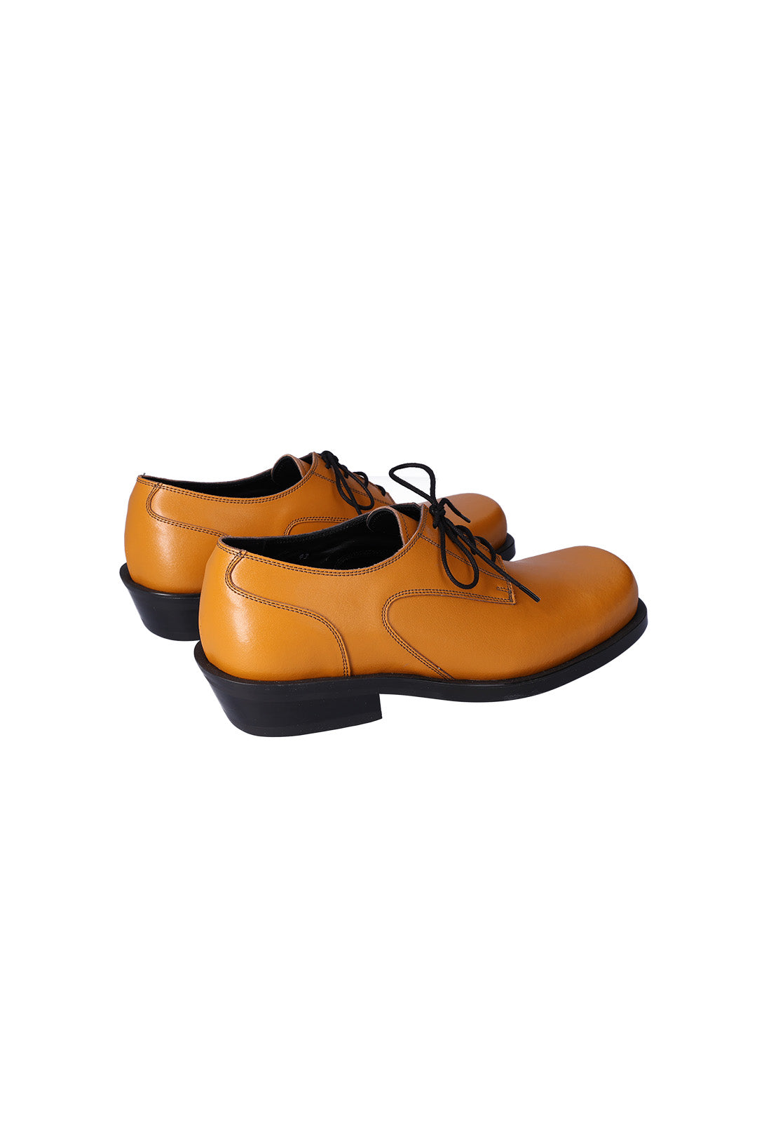 Nuosmiq Hardy Derby Mustard Derby shoe in classic leather with brogue detailing, showcasing a polished, stylish footwear design.