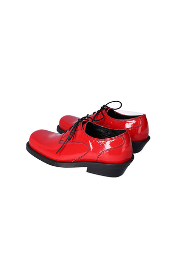 Nuosmiq Hardy Derby Red derby shoe with red leather upper, stylish design, and classic lace-up closure.