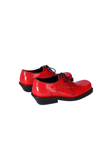 Nuosmiq Hardy Derby Red leather derby shoe with red finish, featuring classic lace-up design and polished leather surface.
