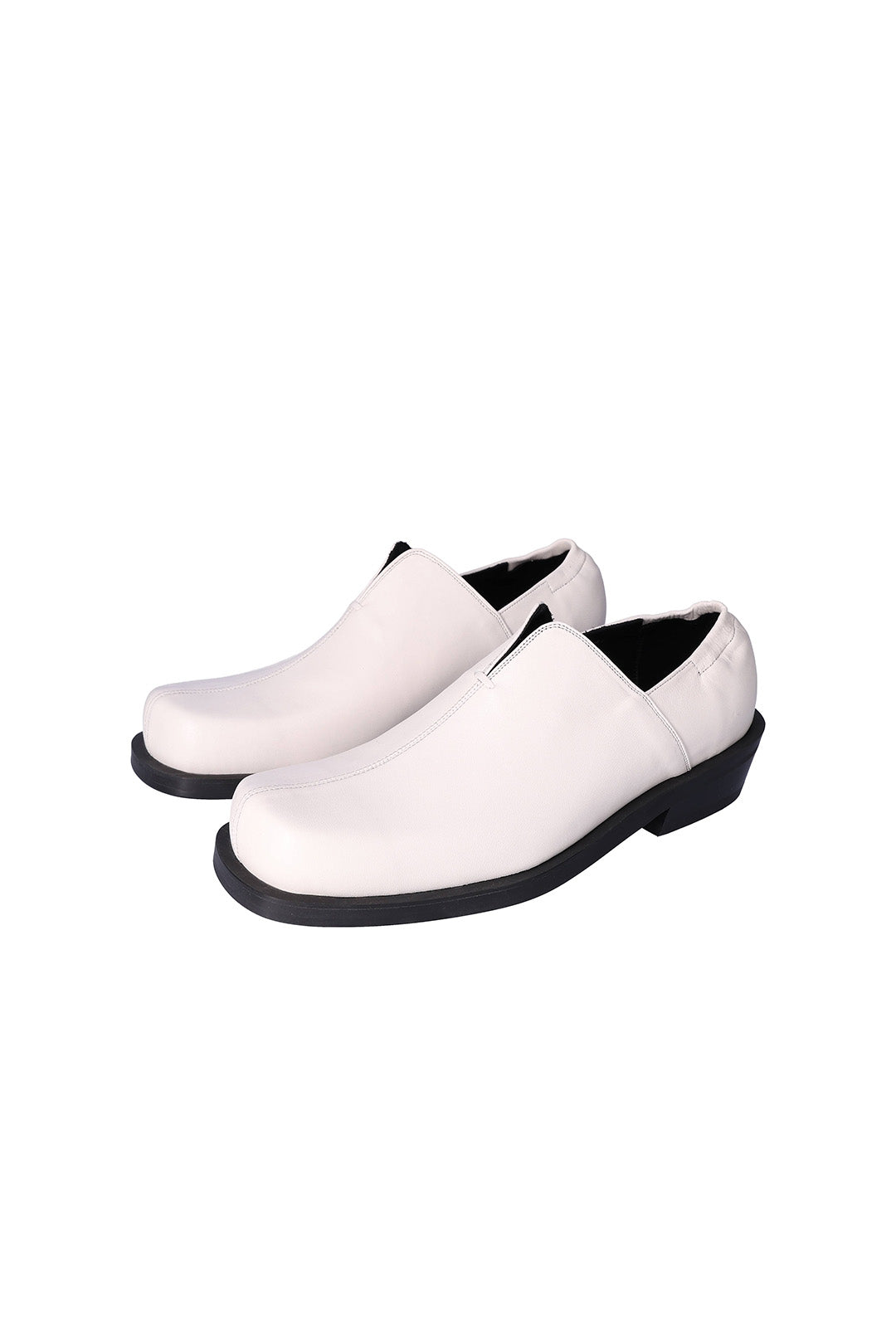 Nuosmiq Nujan Slips Ivory loafers showing smooth ivory leather with sleek design and slip-on style.