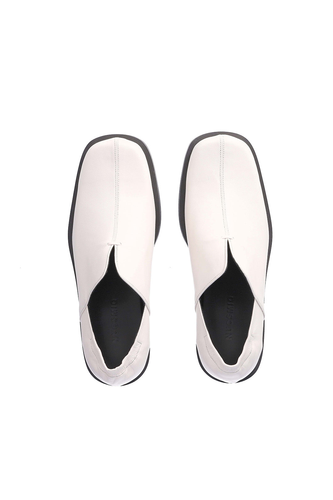 Nuosmiq Nujan Slips Ivory loafers with sleek design and smooth leather finish, displayed on a neutral background.