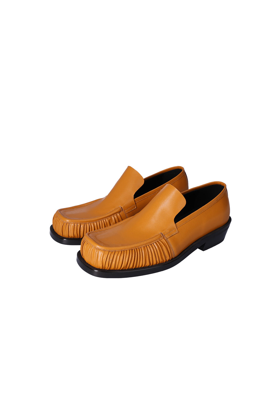 Nuosmiq Sina Winkle Mustard loafers in mustard yellow leather with slip-on design and stitching details.