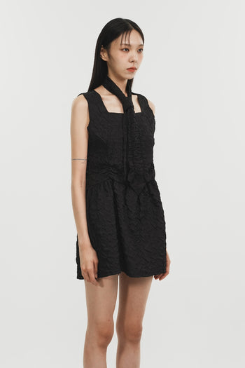 Black Phenomenon Seeper Shirring Raindrop Dress with gathered fabric and flowing silhouette, one-size fits most.