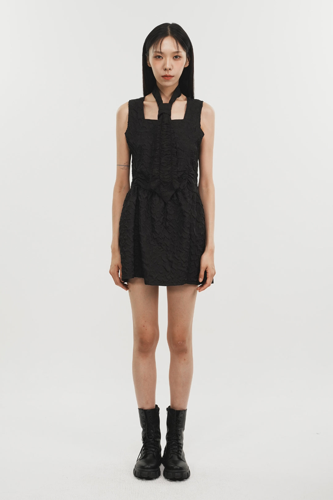 Black Phenomenon Seeper Shirring Raindrop Dress, one-size with gathered fabric and elegant design, displayed on a hanger.