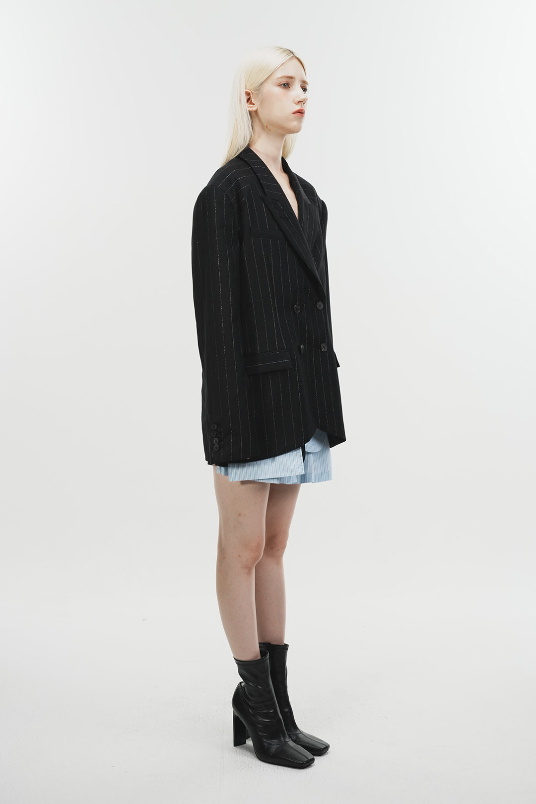 Black Phenomenon Seeper jacket featuring a shirt pocket and metal accents, designed for a stylish and edgy look.