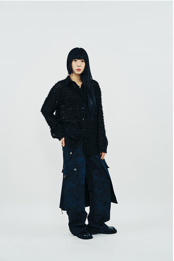 Black Taseel Fly shirt by Phenomenon Seeper, featuring a stylish design and one-size fit, displayed on a hanger.