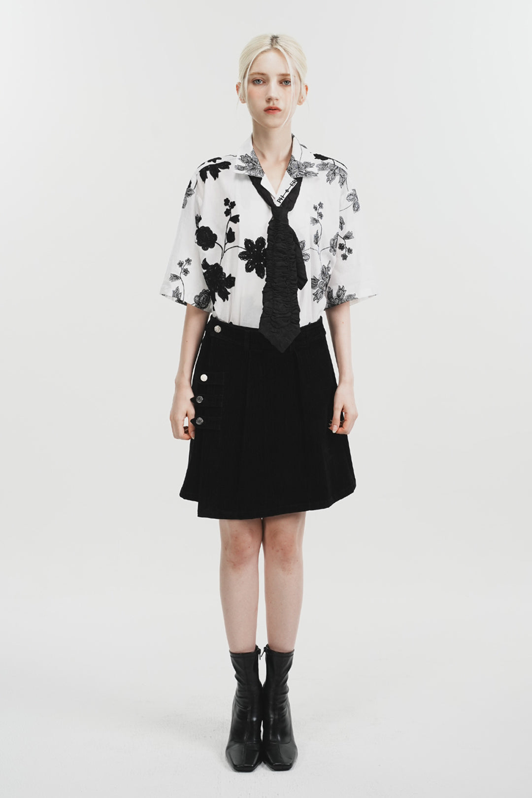 White Phenomenon Seeper Unbalance Flower Half Shirt with a relaxed fit and bold floral design, casual fashion for men and women.