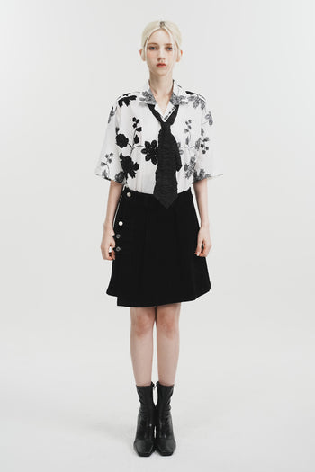 White Phenomenon Seeper Unbalance Flower Half Shirt with a relaxed fit and bold floral design, casual fashion for men and women.