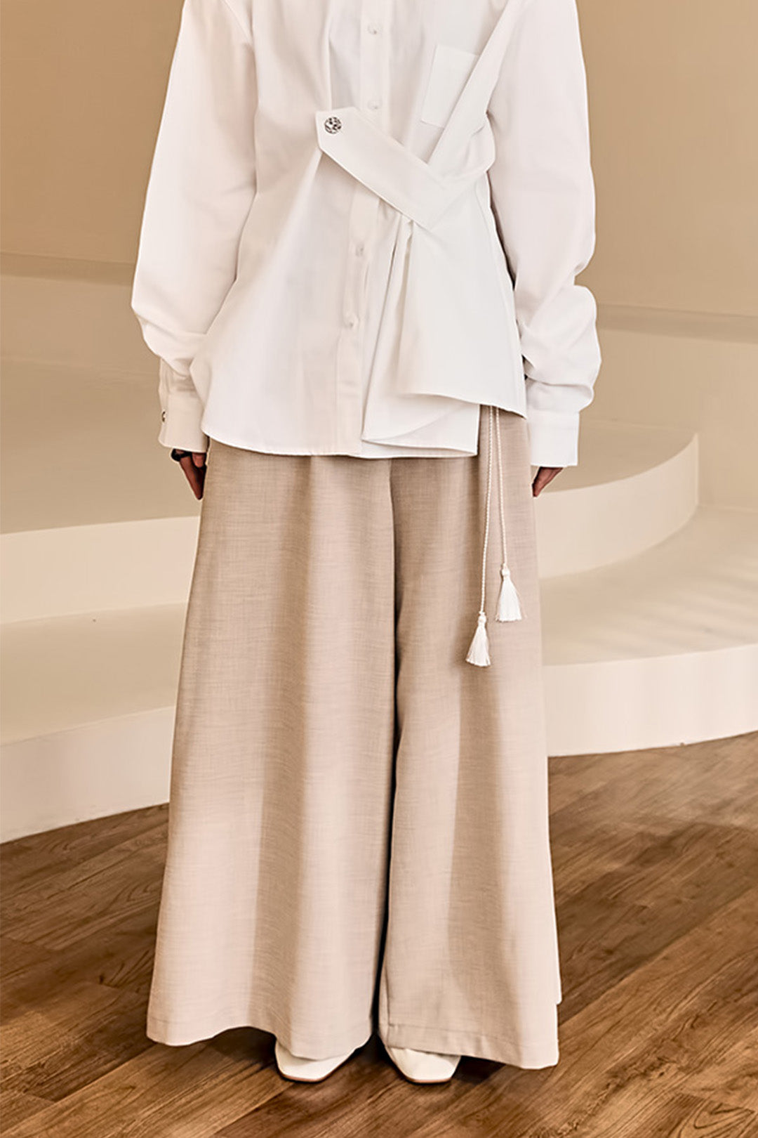 Reculer Maximal Wide Beige bottoms, one-size, featuring a relaxed fit and soft beige fabric, suitable for casual wear.