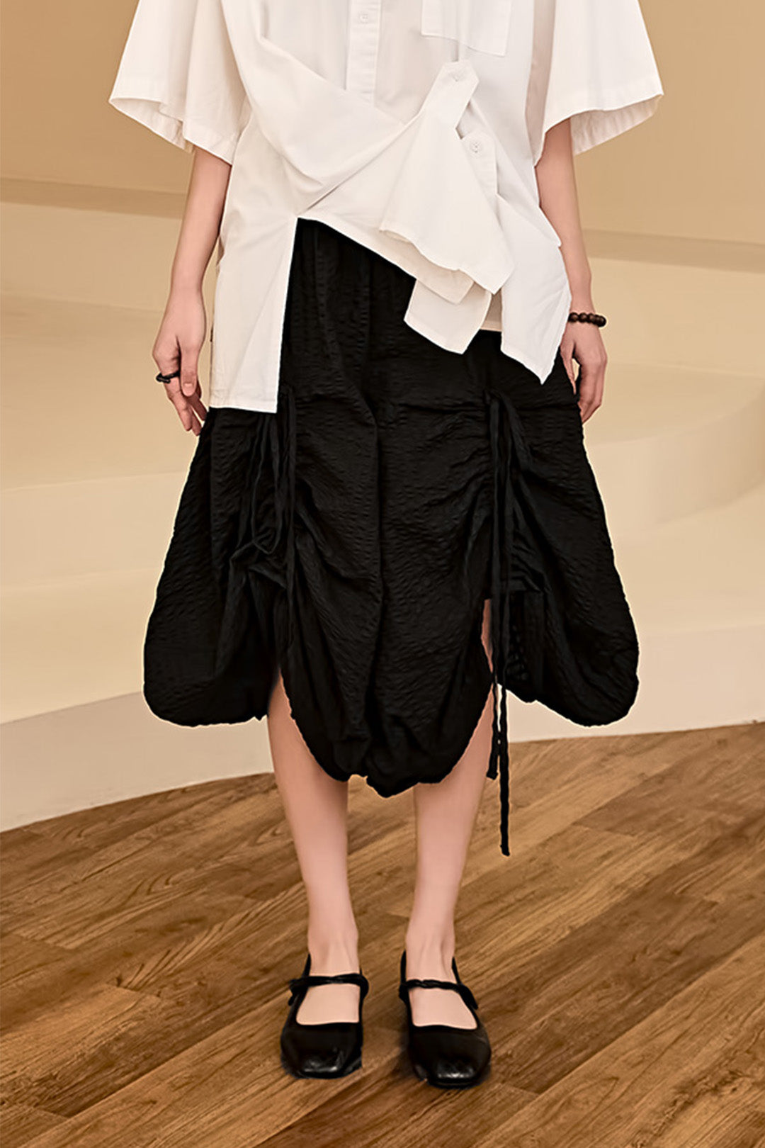 Reculer black shirring skirt pants, one-size bottoms with a relaxed fit and gathered detailing, stylish and comfortable for everyday wear.