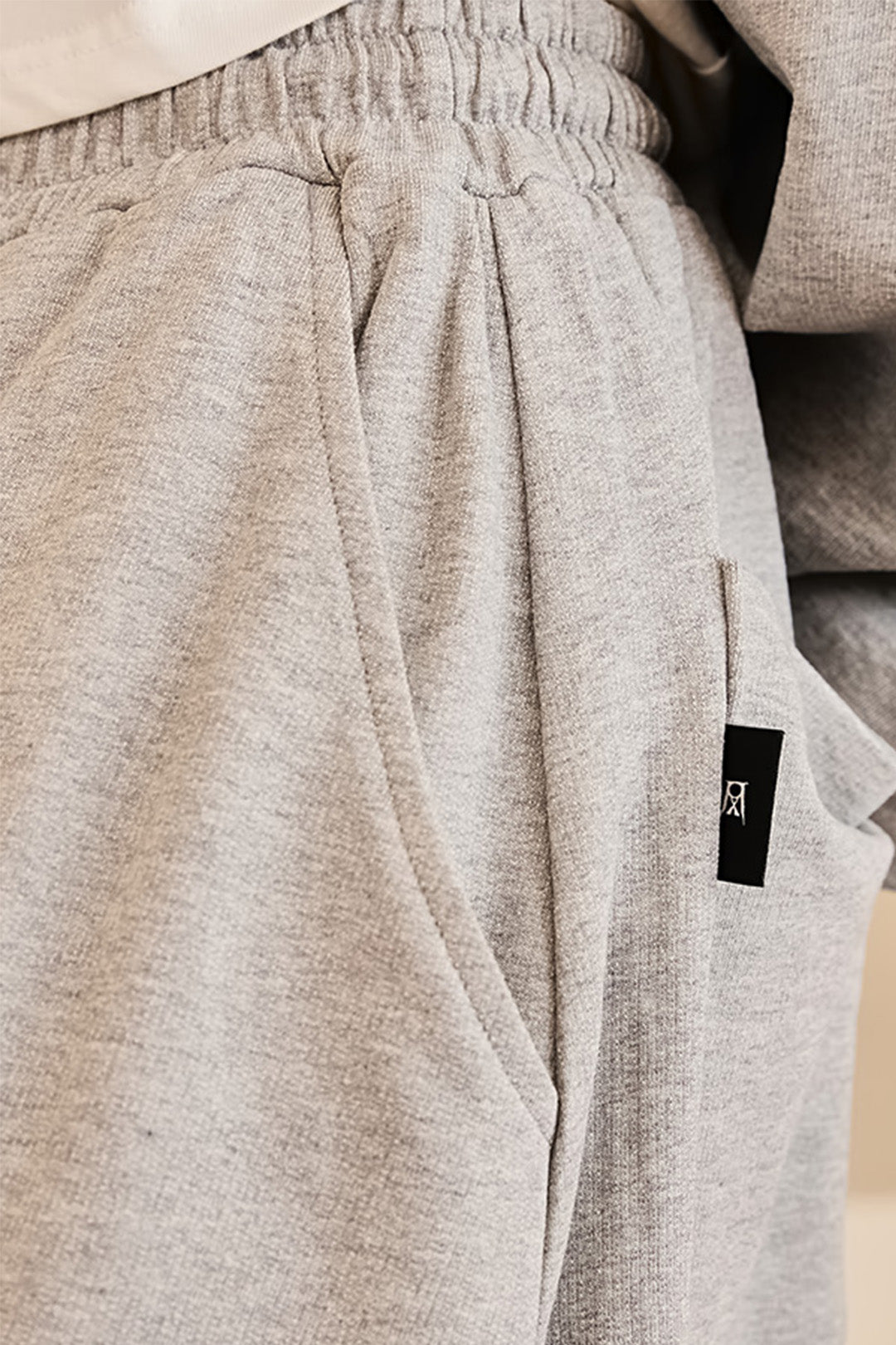 Reculer grey sweat skirt pants for women, casual bottoms with a relaxed fit, made from soft, comfortable fabric.