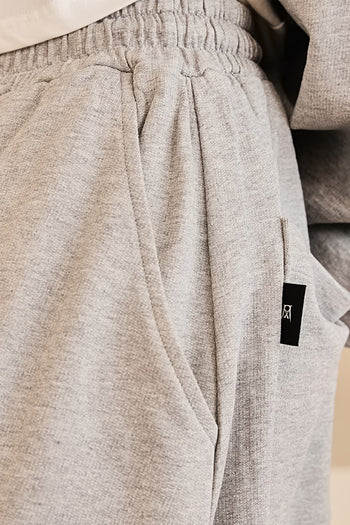 Reculer grey sweat skirt pants for women, casual bottoms with a relaxed fit, made from soft, comfortable fabric.
