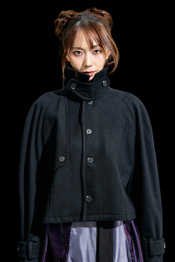 Black Reglan Trench Cropped Wool Coat by Reculer, featuring a tailored fit, cropped length, and classic trench design.