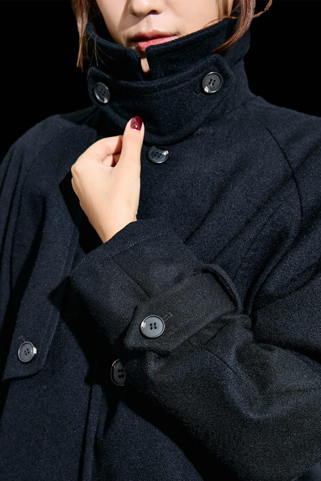 Reculer black Reglan trench cropped wool coat, stylish and warm with a tailored fit, shown on a model.
