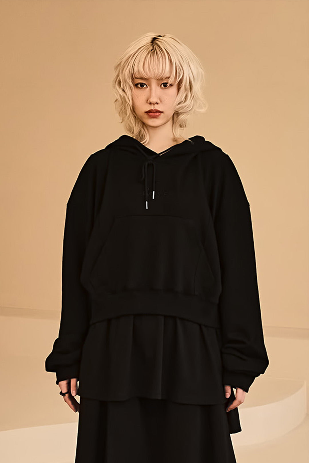Reculer black layered hoodie, one size, with a multi-layered design and casual fit, shown on a plain background.