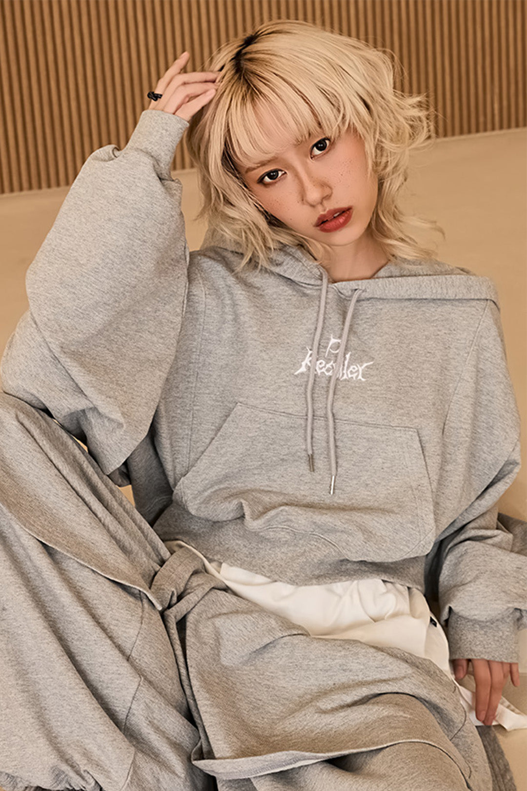 Reculer grey layered hoodie, one size, featuring a casual fit with multiple fabric layers and a hood for cozy style.