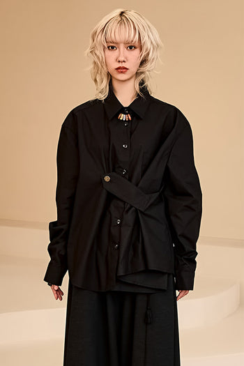 Draping Basic Shirt Black by Reculer. This oversized cotton shirt features an adjustable tab for a stylish draped silhouette. Perfect for a modern look