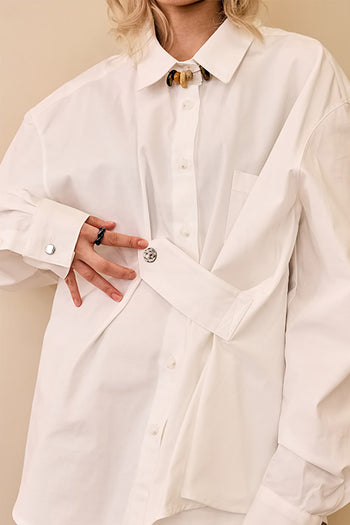 Reculer ivory draping basic shirt, lightweight and stylish with a relaxed fit, shown on a model in a casual setting.