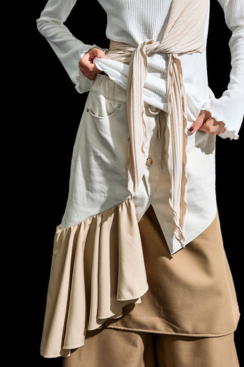 Ivory Reculer cowl string draped T-shirt with coloration detail, casual shirt style, one-size fit, soft fabric, and relaxed fit.