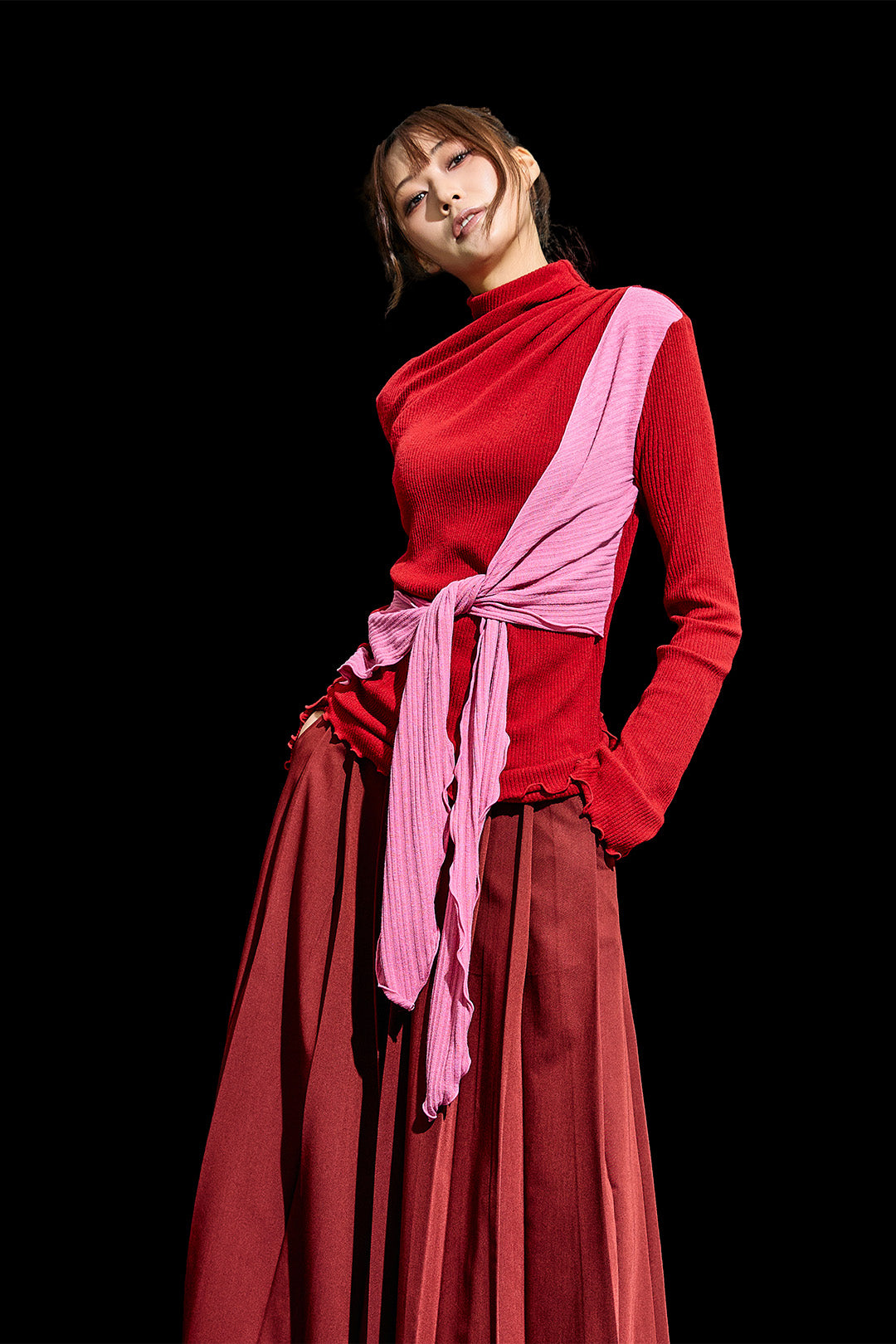 Red Reculer cowl string draped T-shirt featuring a relaxed fit and unique colouration, styled as a casual shirt.